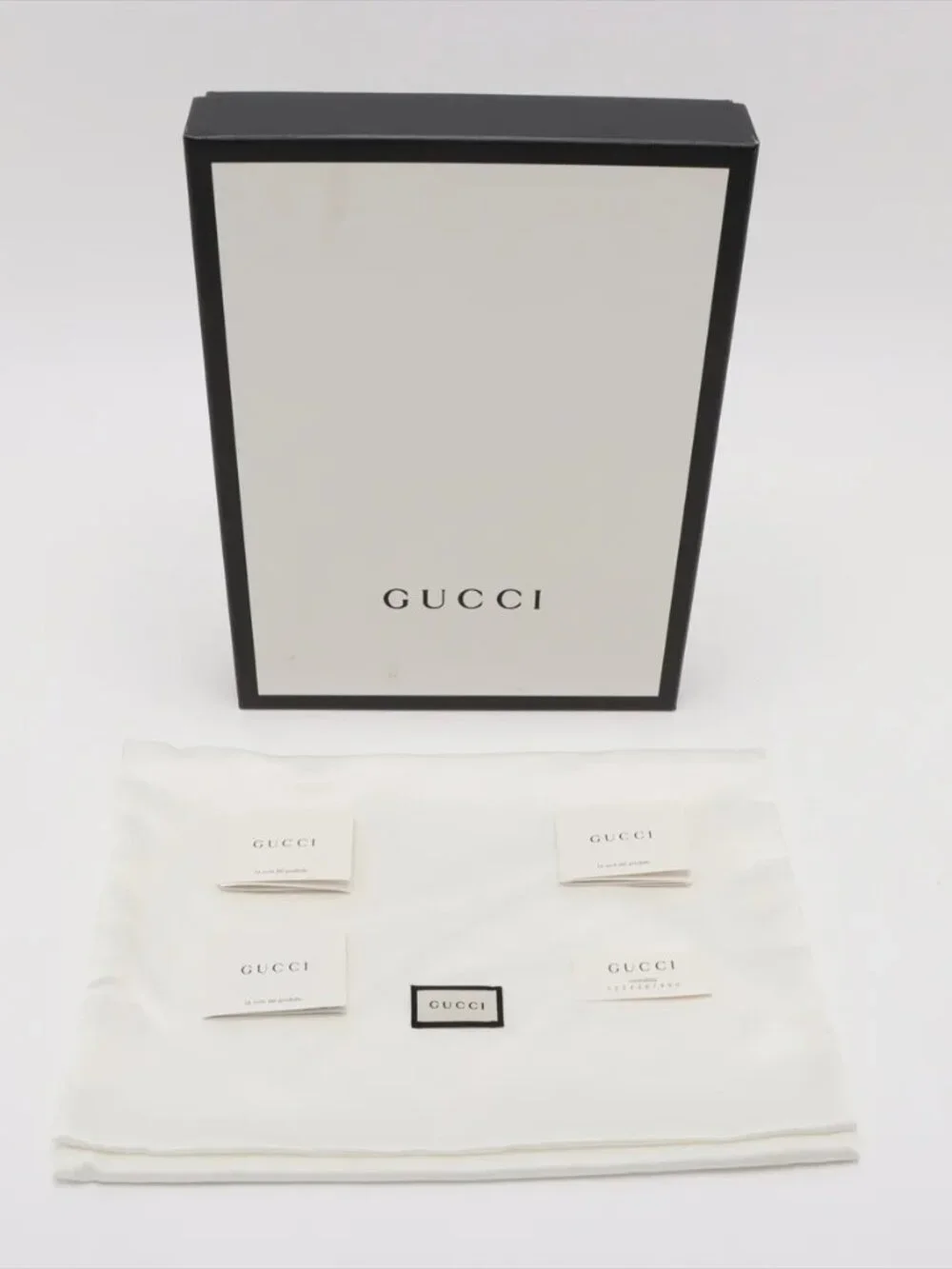 Gucci GG Supreme PVC & leather Clutch bag Beige x black 473904